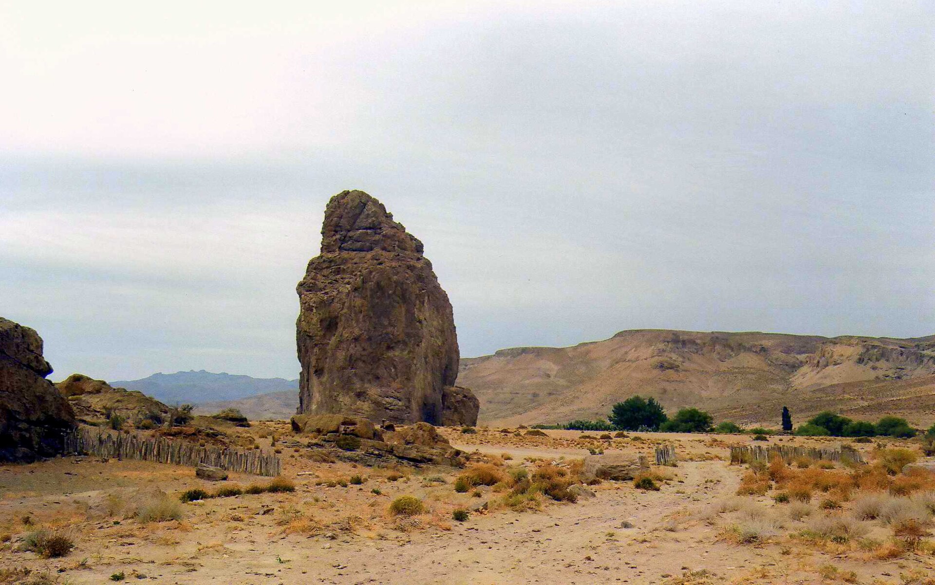 Road and volcanic rock in Patagonian steppe
